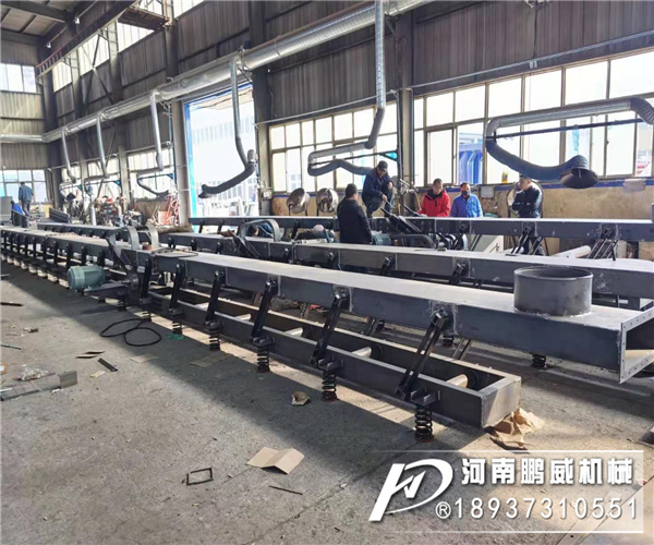 長距離振動輸送機